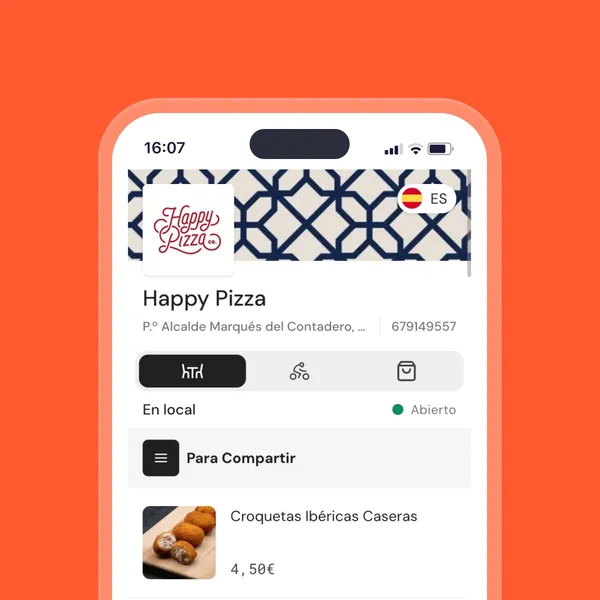 Carta digital QR de Qamarero abierta en un móvil sobre la mesa de un restaurante